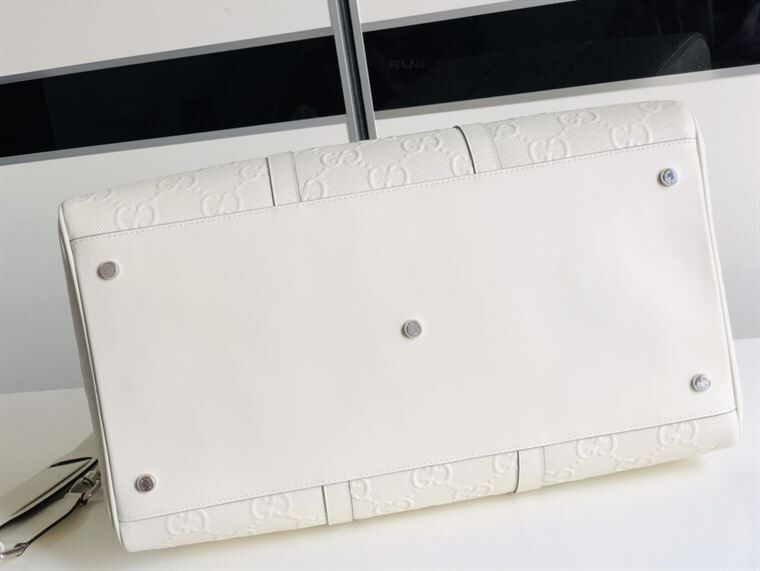 GUCCI GG EMBOSSED DUFFLE BAG - BG015