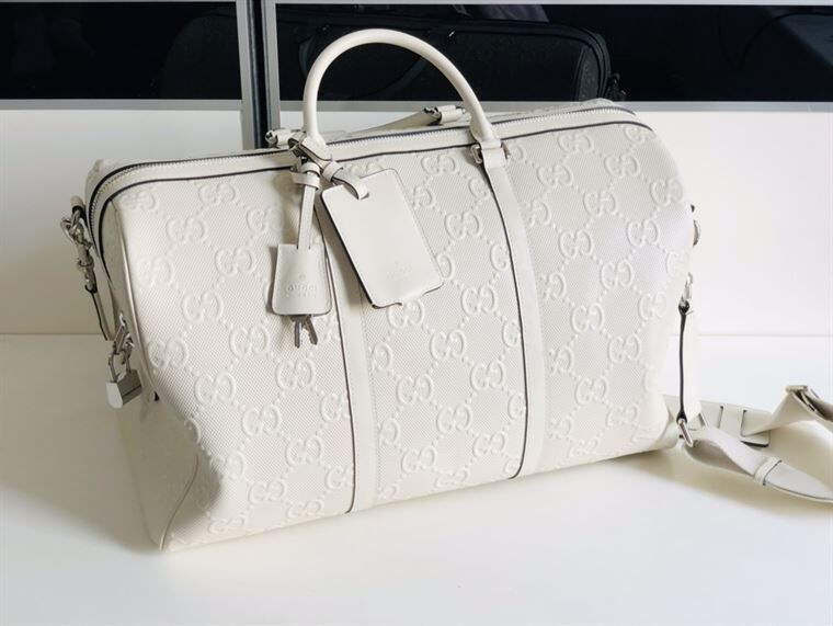GUCCI GG EMBOSSED DUFFLE BAG - BG015