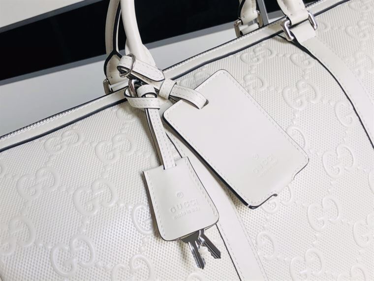 GUCCI GG EMBOSSED DUFFLE BAG - BG015