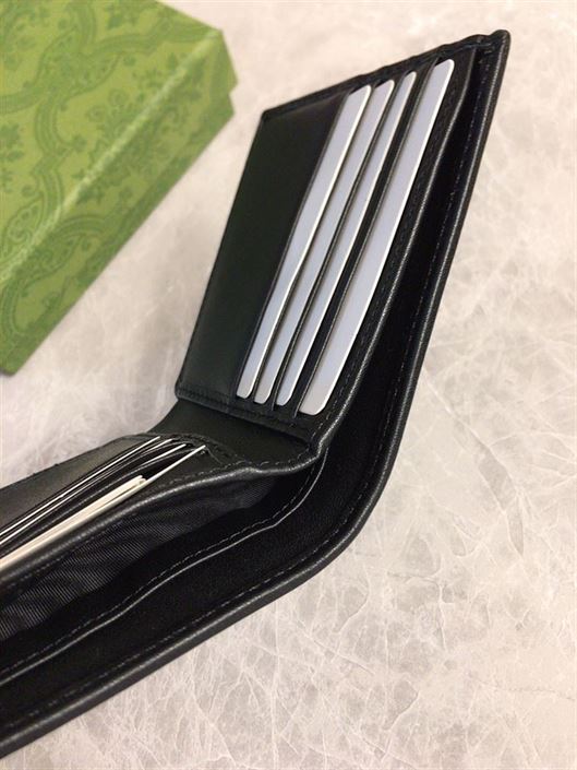 GUCCI GG SUPREME BI-FOLD WALLET