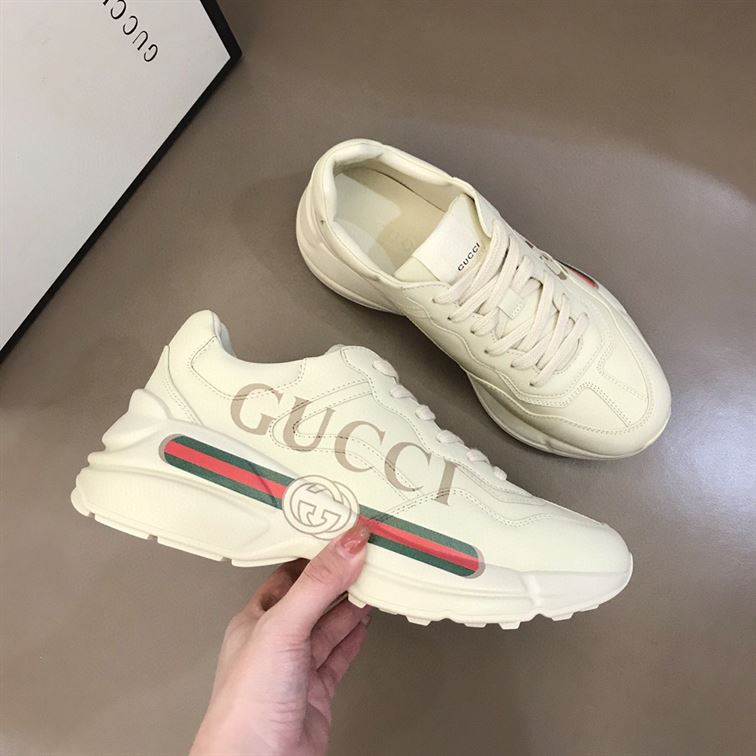 GUCCI WOMEN'S RHYTON GUCCI LOGO LEATHER SNEAKER - GCC008