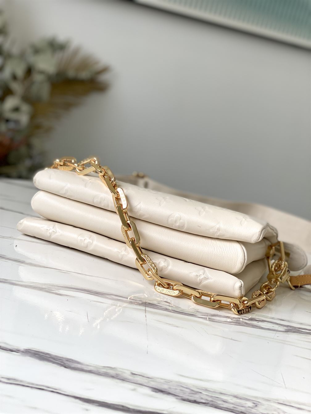 LOUIS VUITTON COUSSIN PM White