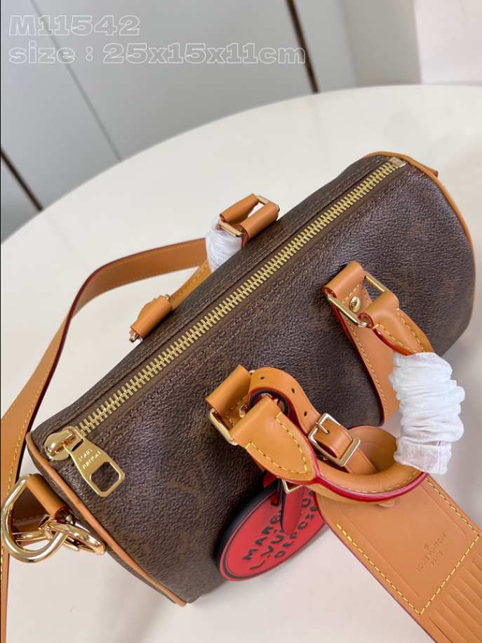 Louis Vuitton Keepall Bandoulière 25 Bag Gold - LW130