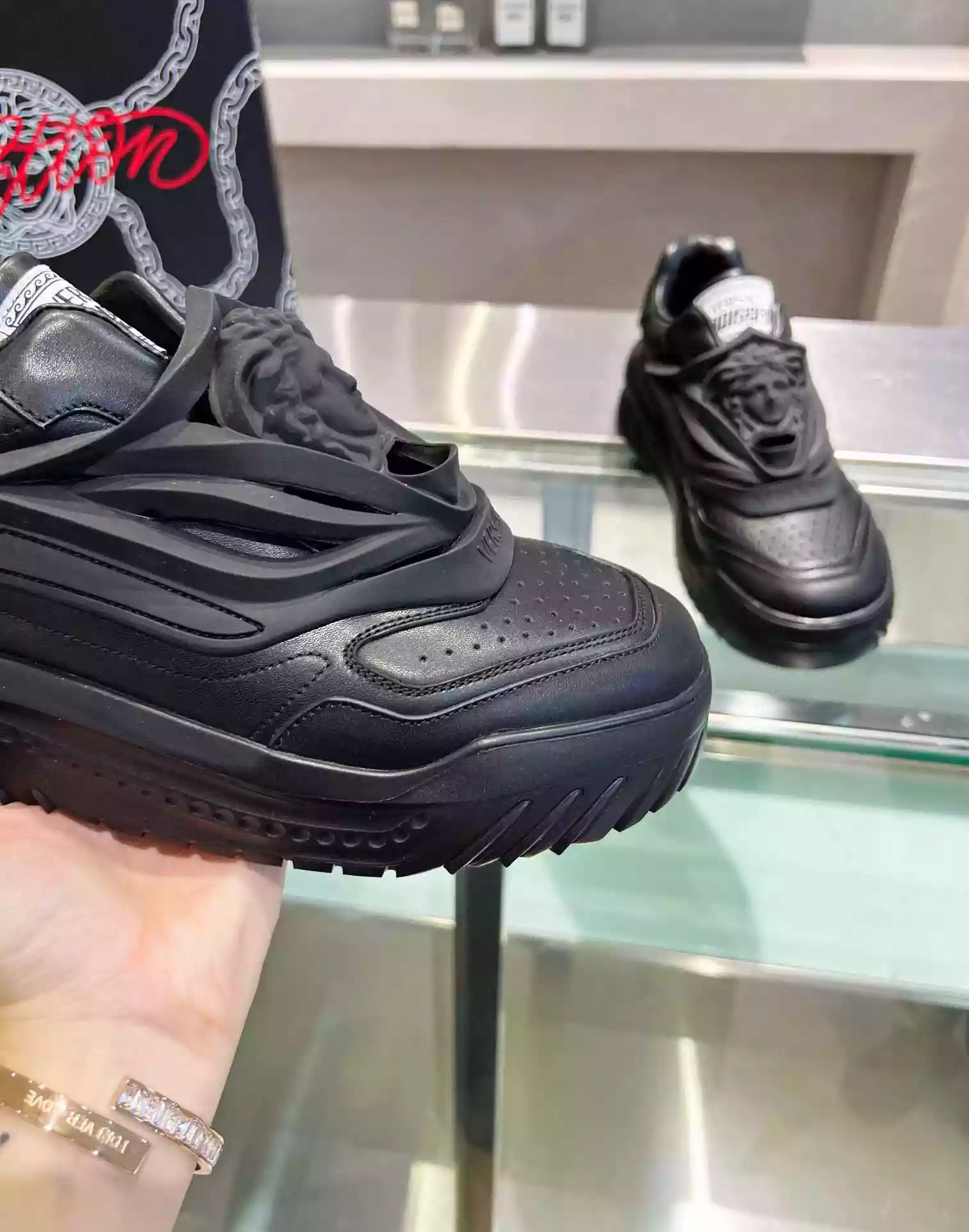 VERSACE WOMEN'S ODISSEA SNEAKERS IN BLACK LEATHER - VSS017