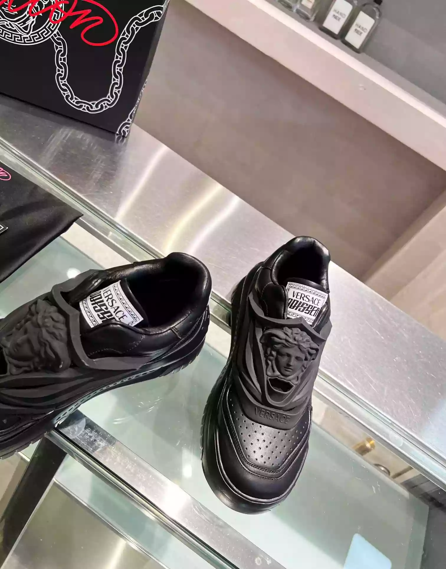 VERSACE WOMEN'S ODISSEA SNEAKERS IN BLACK LEATHER - VSS017