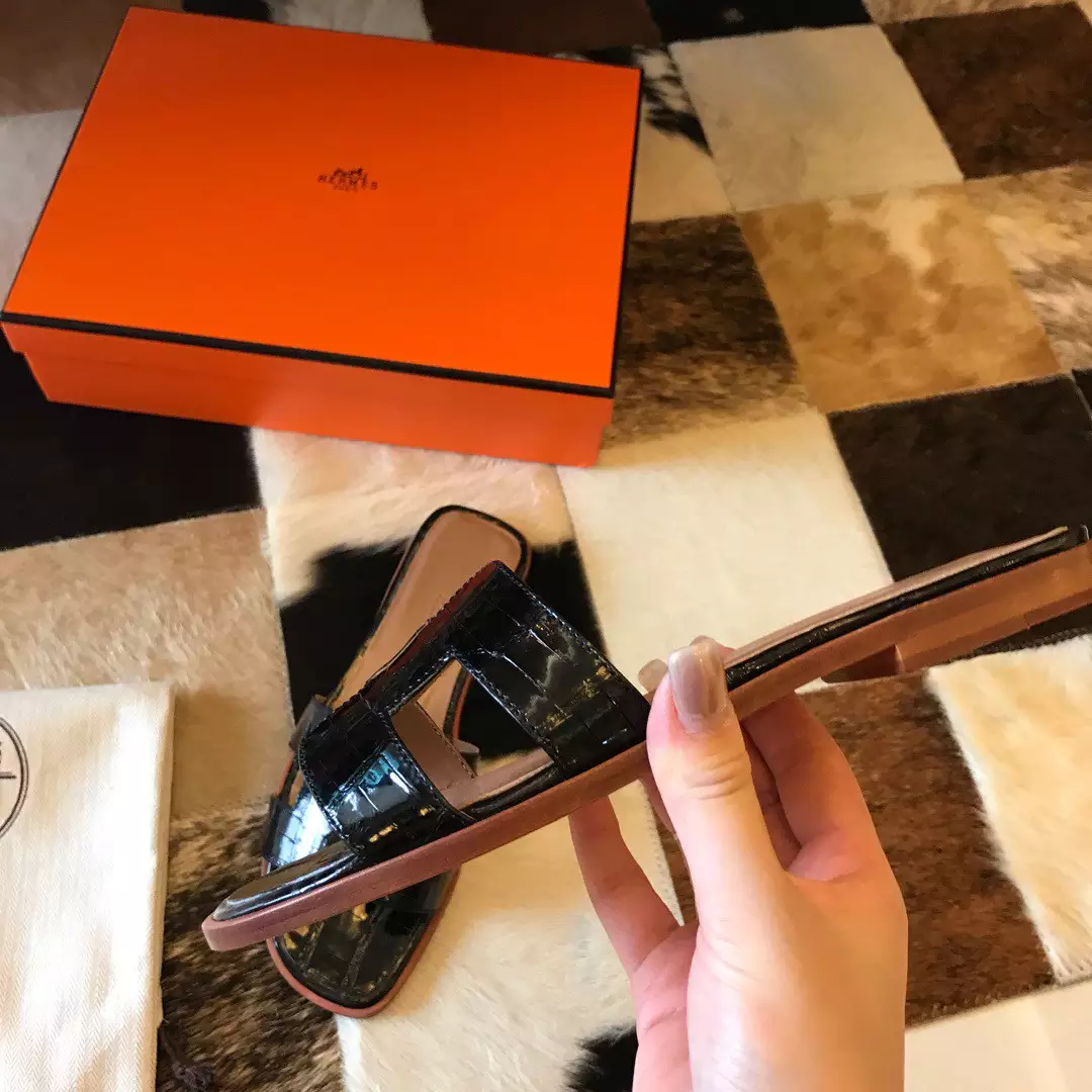 HERMES ORAN SLIDE SANDALS IN BLACK SHINY NILOTICUS CROCODILE SKIN - HMSD046