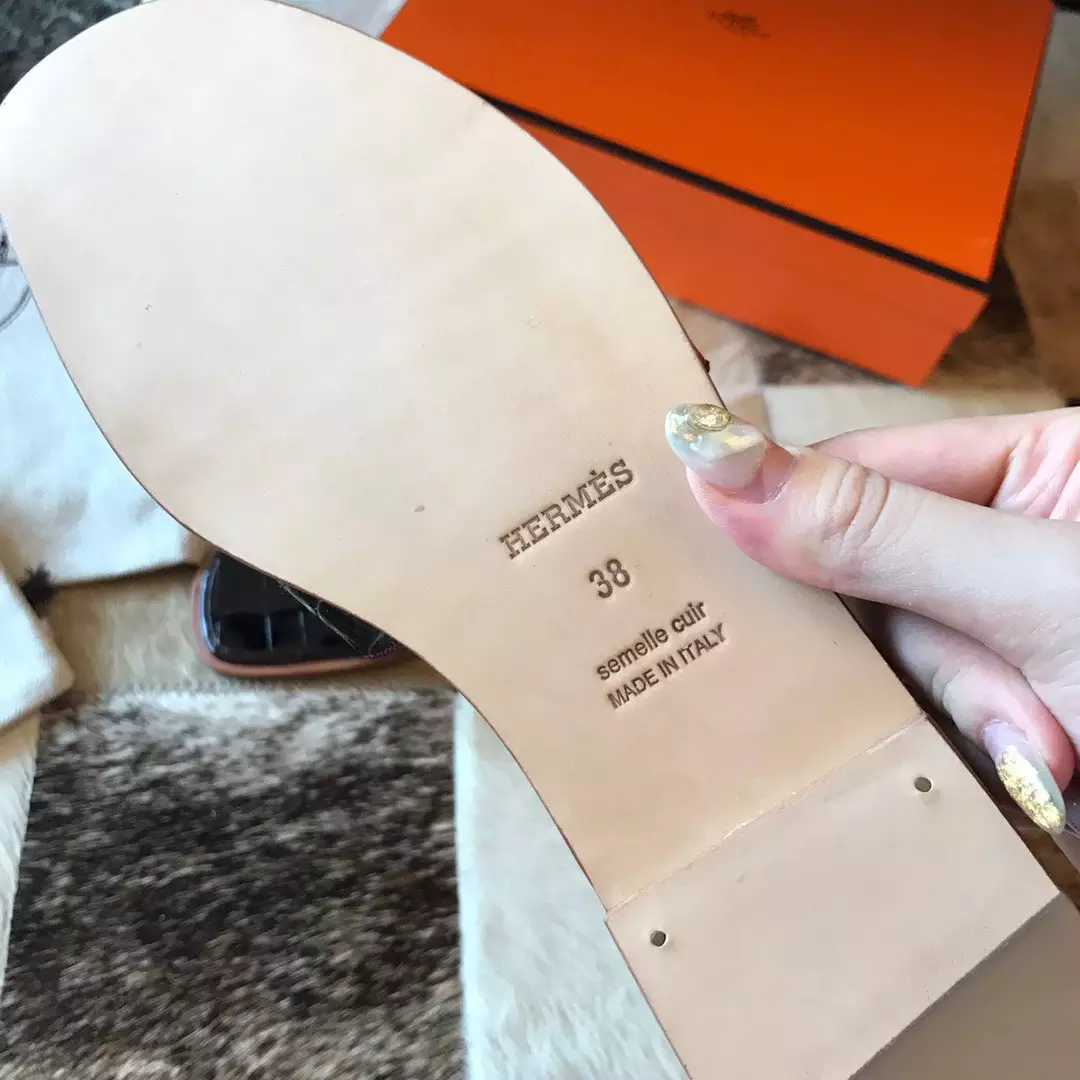 HERMES ORAN SLIDE SANDALS IN BLACK SHINY NILOTICUS CROCODILE SKIN - HMSD046