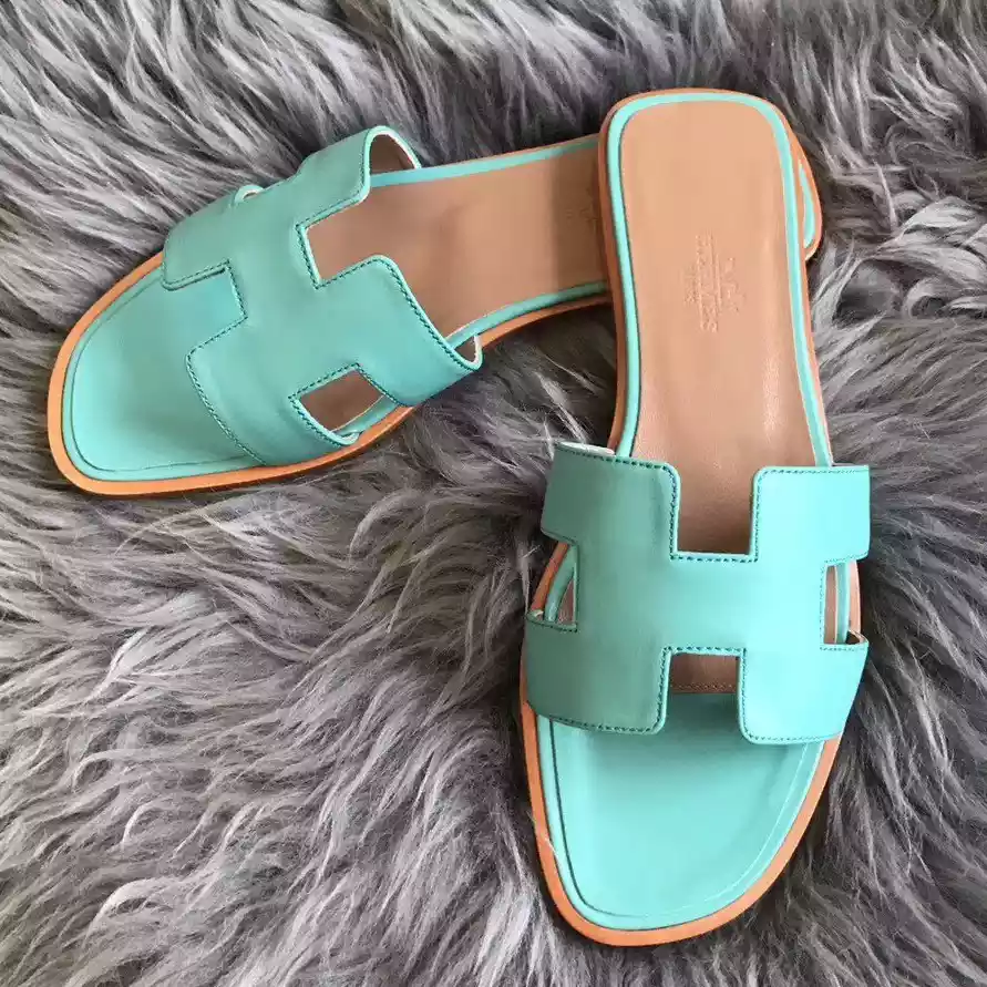 HERMES ORAN SLIDE SANDALS IN BLUE ATOLL SWIFT CALFSKIN - HMSD123
