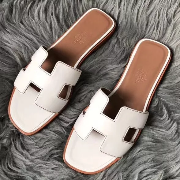 HERMES ORAN SLIDE SANDALS IN WHITE SWIFT CALFSKIN - HMSD130