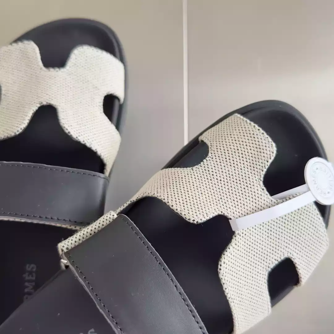 HERMES WOMEN'S CHYPRE SANDALS IN CANVAS WITH BLACK LEATHER - HMSD014