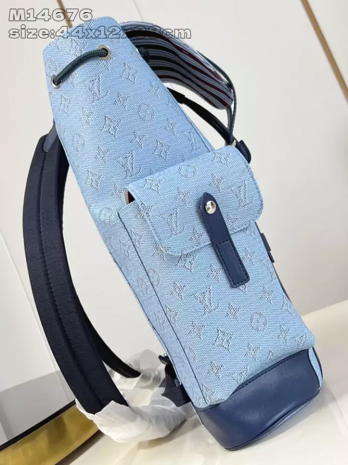 CHRISTOPHER MM BACKPACK BLUE MONOGRAM HERITAGE CANVAS M14676 - LW335 DISCOVERY BACKPACK PM SKY BLUE MONOGRAM CANVAS