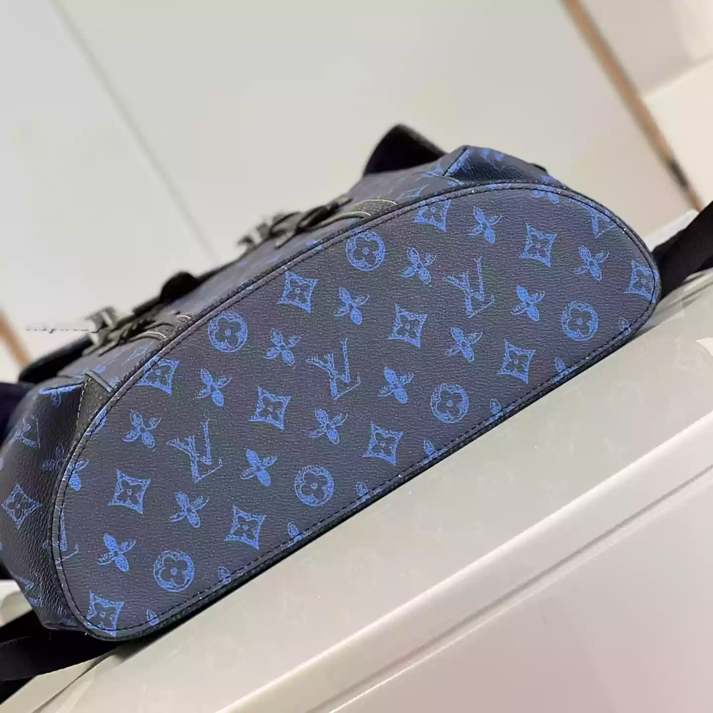 CHRISTOPHER MM MONOGRAM BACKPACK IN BLUE - LW345 DISCOVERY BACKPACK PM SKY BLUE MONOGRAM CANVAS