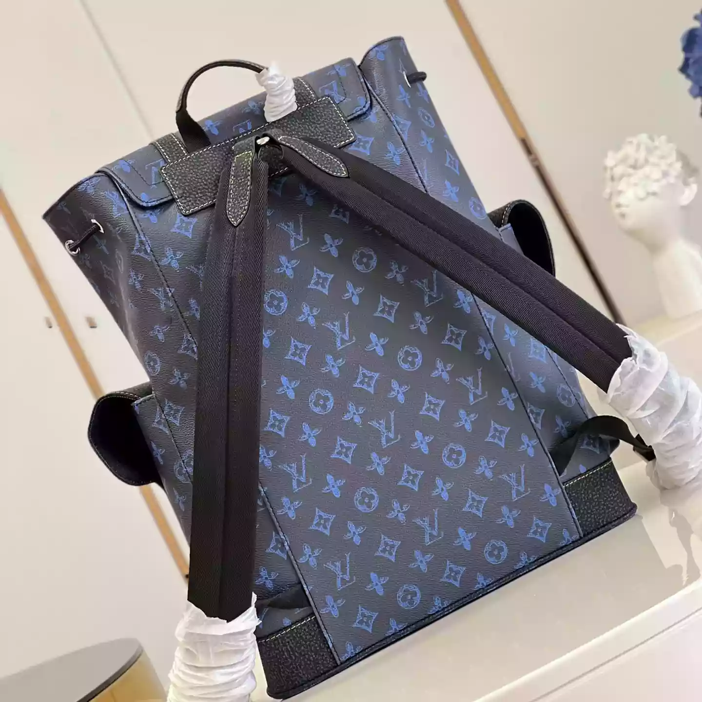 CHRISTOPHER MM MONOGRAM BACKPACK IN BLUE - LW345 DISCOVERY BACKPACK PM SKY BLUE MONOGRAM CANVAS