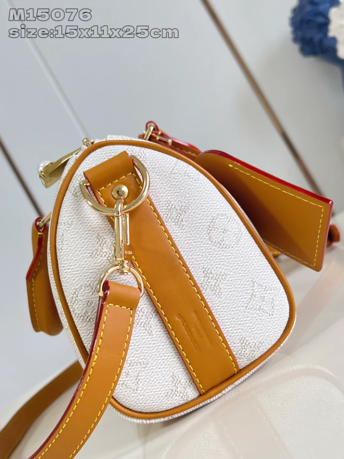 KEEPALL BANDOULIERE 25 BROWN MONOGRAM HERITAGE CANVAS M15076 - LW417 DISCOVERY BACKPACK PM SKY BLUE MONOGRAM CANVAS