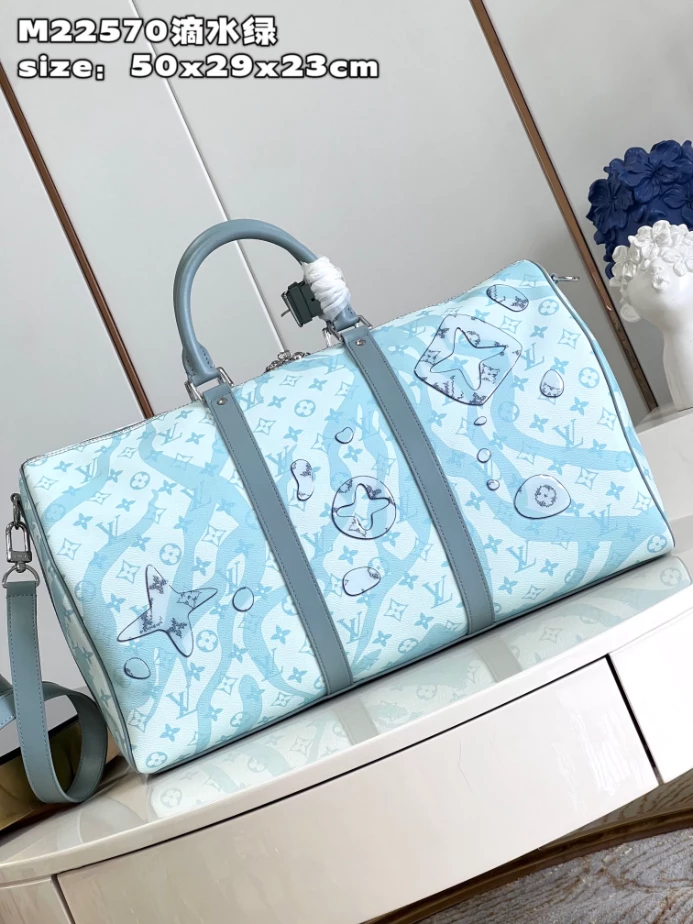 KEEPALL BANDOULIERE 50 BAG IN MONOGRAM AQUAGARDEN M22570 - LW374 DISCOVERY BACKPACK PM SKY BLUE MONOGRAM CANVAS