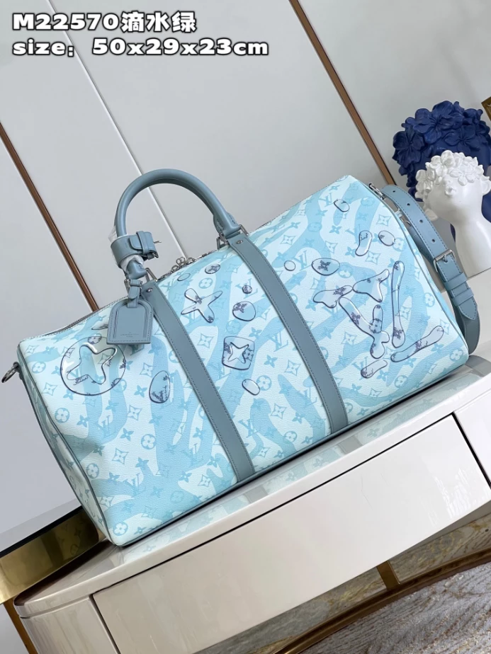 KEEPALL BANDOULIERE 50 BAG IN MONOGRAM AQUAGARDEN M22570 - LW374 DISCOVERY BACKPACK PM SKY BLUE MONOGRAM CANVAS