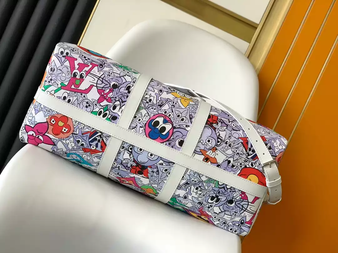 KEEPALL BANDOULIERE BAG 50 MATERIAL MONOGRAM COMICS CANVAS - LW365 DISCOVERY BACKPACK PM SKY BLUE MONOGRAM CANVAS