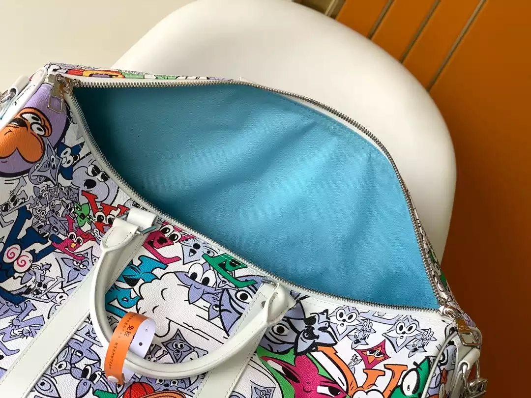 KEEPALL BANDOULIERE BAG 50 MATERIAL MONOGRAM COMICS CANVAS - LW365 DISCOVERY BACKPACK PM SKY BLUE MONOGRAM CANVAS