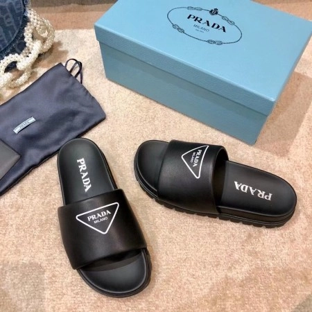 PRADA BLACK LEATHER SLIDES WITH PRINTED TRIANGLE LOGO - PSD088