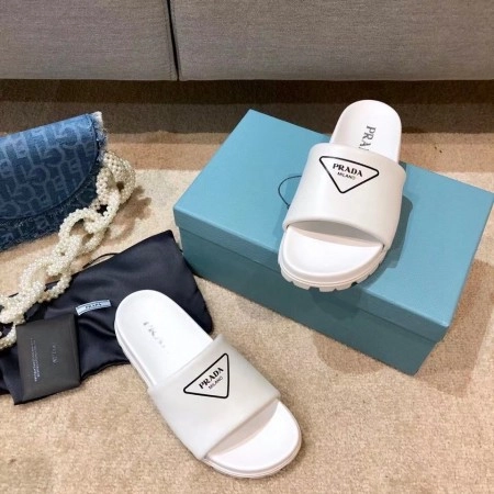 PRADA WHITE LEATHER SLIDES WITH PRINTED TRIANGLE LOGO - PSD089