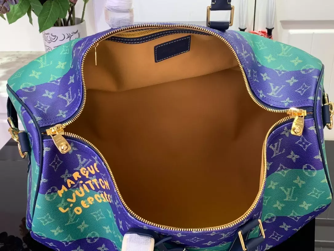 KEEPALL BANDOULIÈRE 50 LOUIS VUITTON HERITAGE - LW454 DISCOVERY BACKPACK PM SKY BLUE MONOGRAM CANVAS